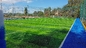 Plancher artificiel de sports d'herbe de l'herbe 60mm de la FIFA du football du football extérieur fournisseur