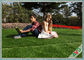 L'herbe artificielle de aménagement stabilisée UV pour des écoles de patios de jardins des terrains de jeux fournisseur
